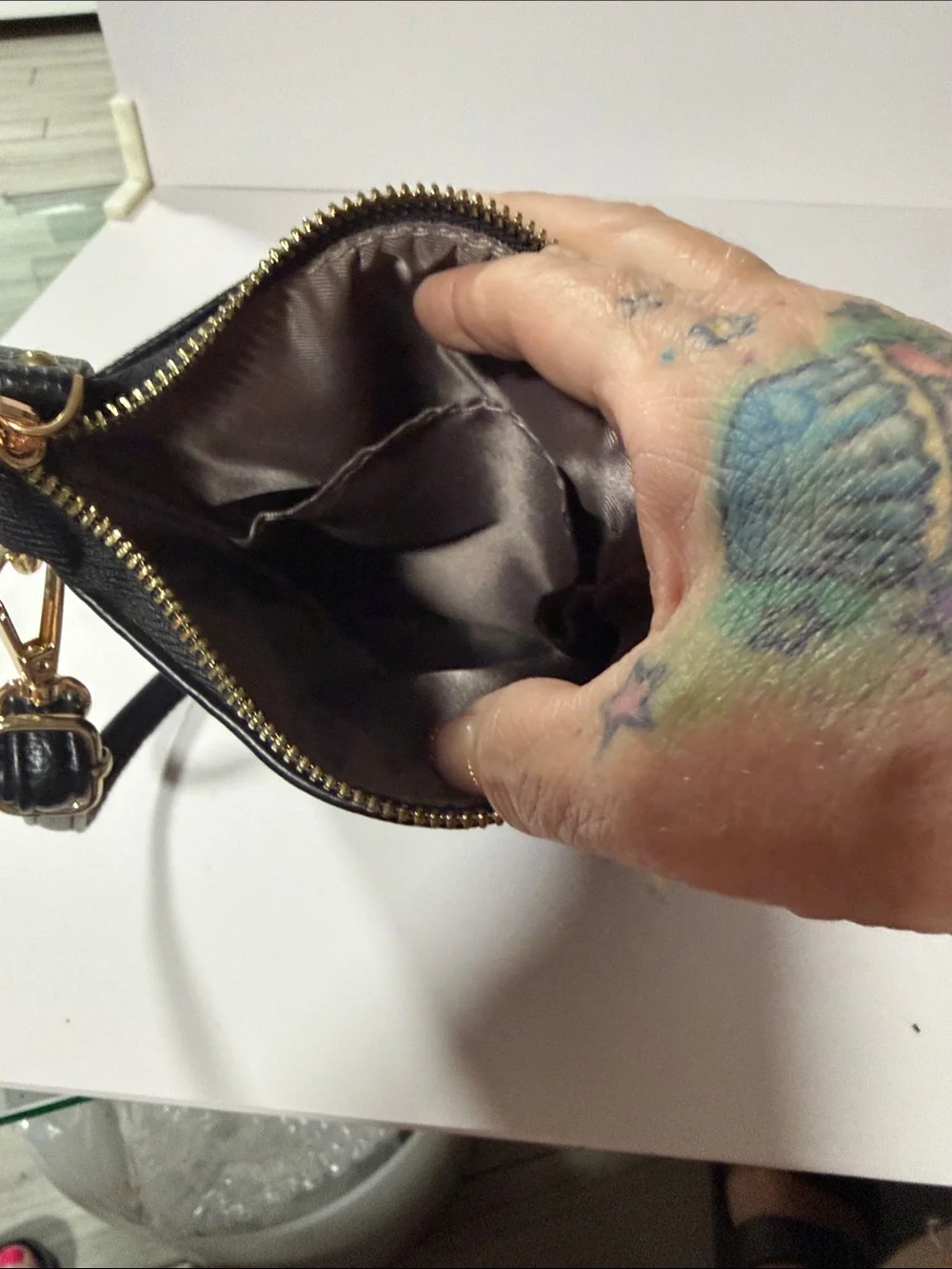 Black Embossed Floral Crossbody Bag with Gold Charm